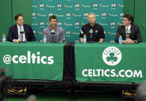 (Waltham, MA 06/01/16) Celtics head coach Brad Stevens (left center) and president Danny Ainge (right center) take turns talking during a press conference announcing their contract extensions. Pictured with them are Celtics owners Steve Pagliuca (left) and Wyc Grousbeck (right). Wednesday, June 1, 2016. Staff photo by John Wilcox.